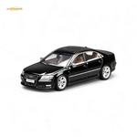 Black toy car model on a white background