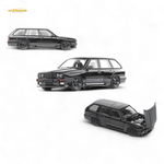 Three views of a black car model on a white background