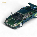 Green model car on a white background