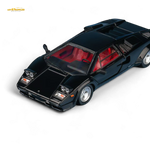 Black model car with red interior on a white background