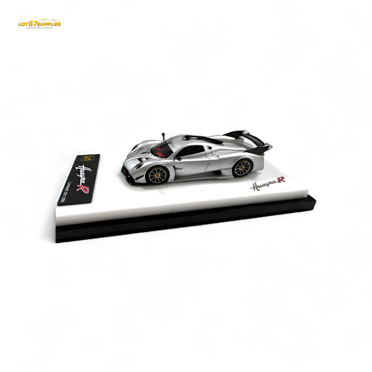 Model car on a display stand with 'Husqvarna' branding on a white background