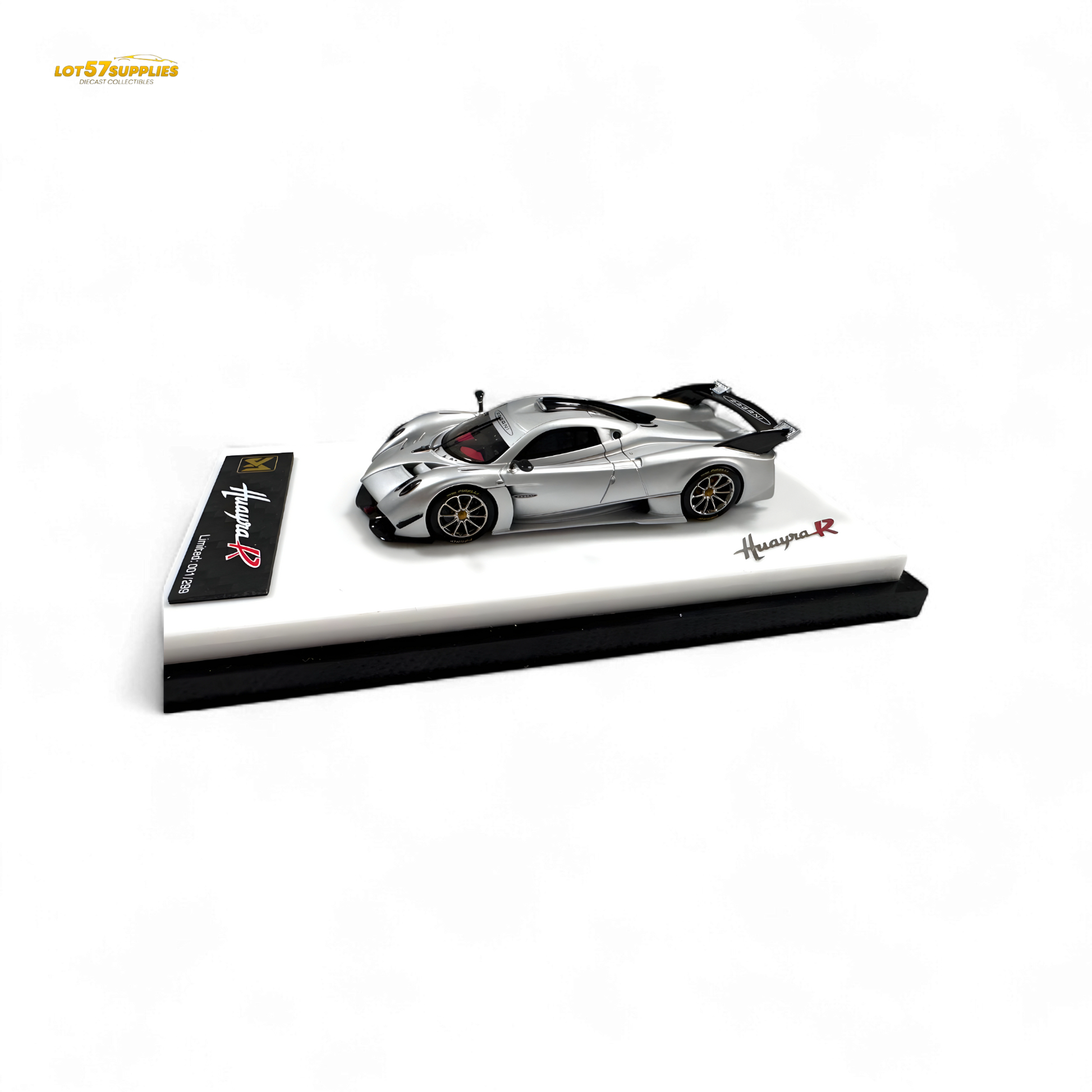 Model car on a display stand with 'Husqvarna' branding on a white background