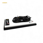 Model car on a display stand with 'Kuwyne R' branding on a white background
