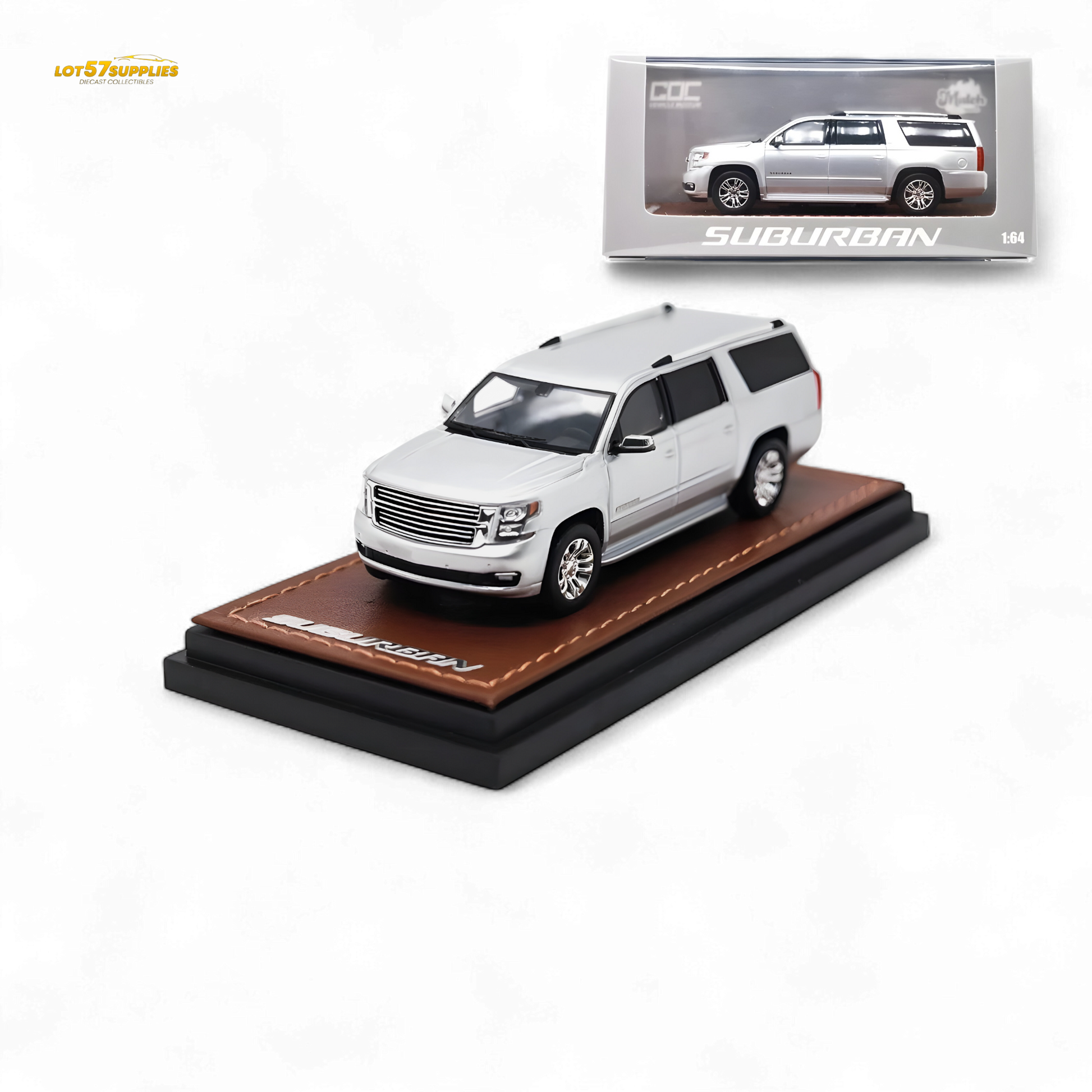 Model of a white SUV on a brown leather stand with a display case in the background.