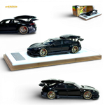 Error404 Porsche Taycan Black with Roof Box 1:64 - Image 1