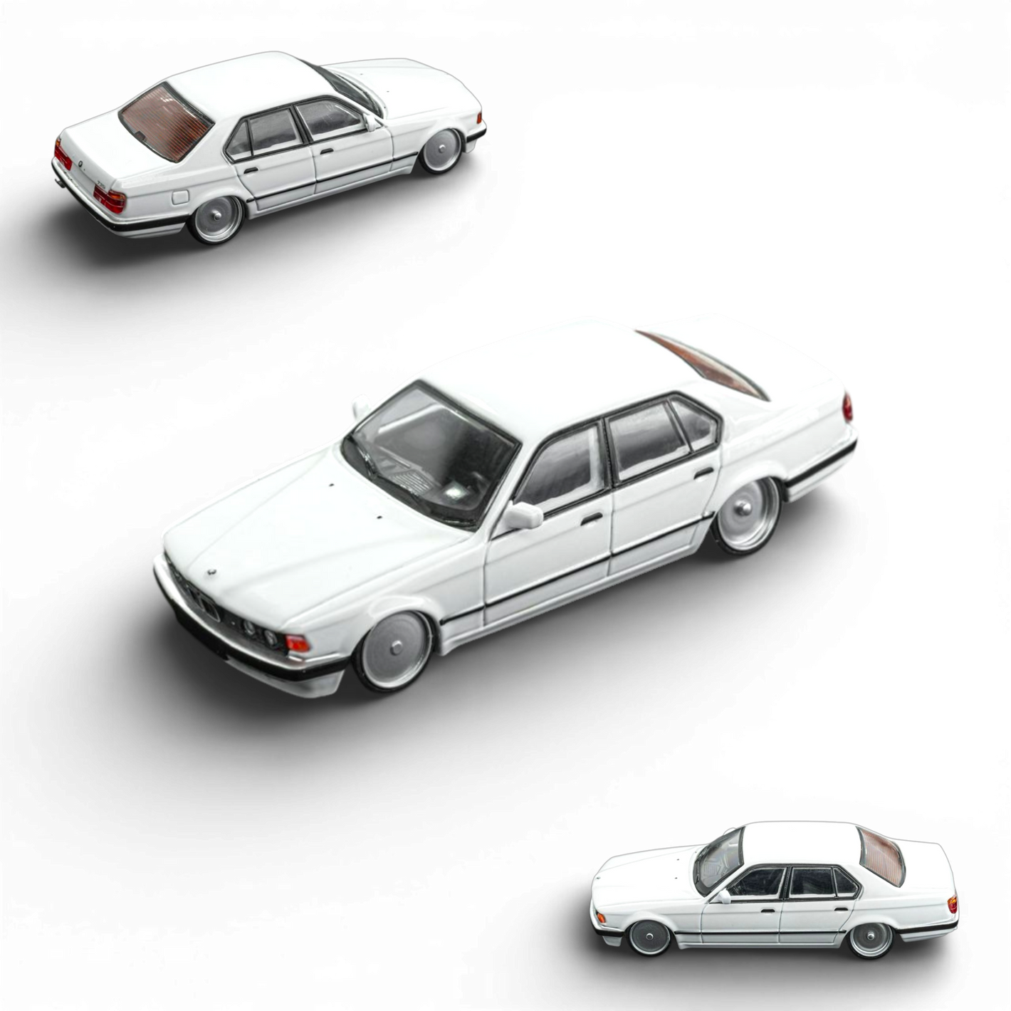 DCM BMW E32 7-Series Sedan - White Lowride 1:64 - Image 1