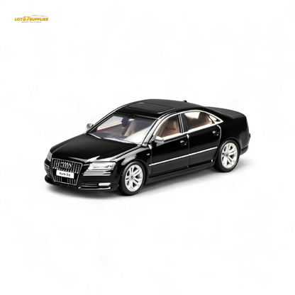 Black toy car model on a white background