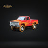 Auto World 1983 Chevrolet Silverado K10 4x4 Muddy LIFTED Squarebody 1:64