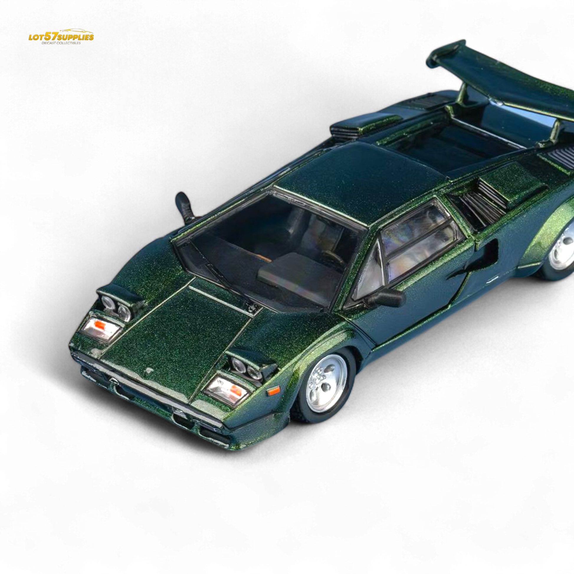 Green model car on a white background