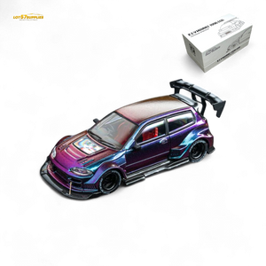 Colorful model car with a large rear wing on a white background