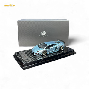 Blue model car on a black stand with a gray box in the background