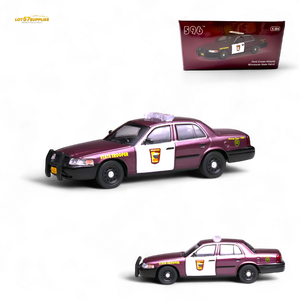 Model police car with 'State Trooper' text and a packaging box in the background.
