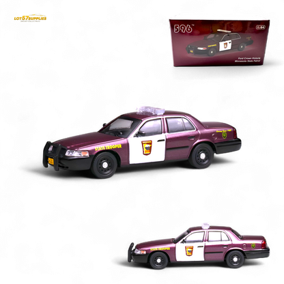 Model police car with 'State Trooper' text and a packaging box in the background.