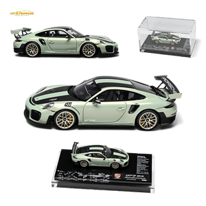 Green Porsche model car with open doors on a white background