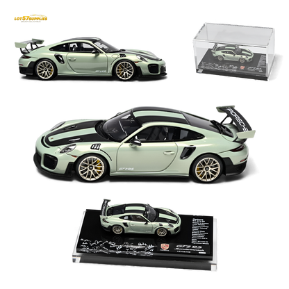 Green Porsche model car with open doors on a white background