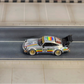 SW RWB Porsche 964 High Wing - Apple Racing Livery 1:64 diecast model, high-angle side view showing big rear wing