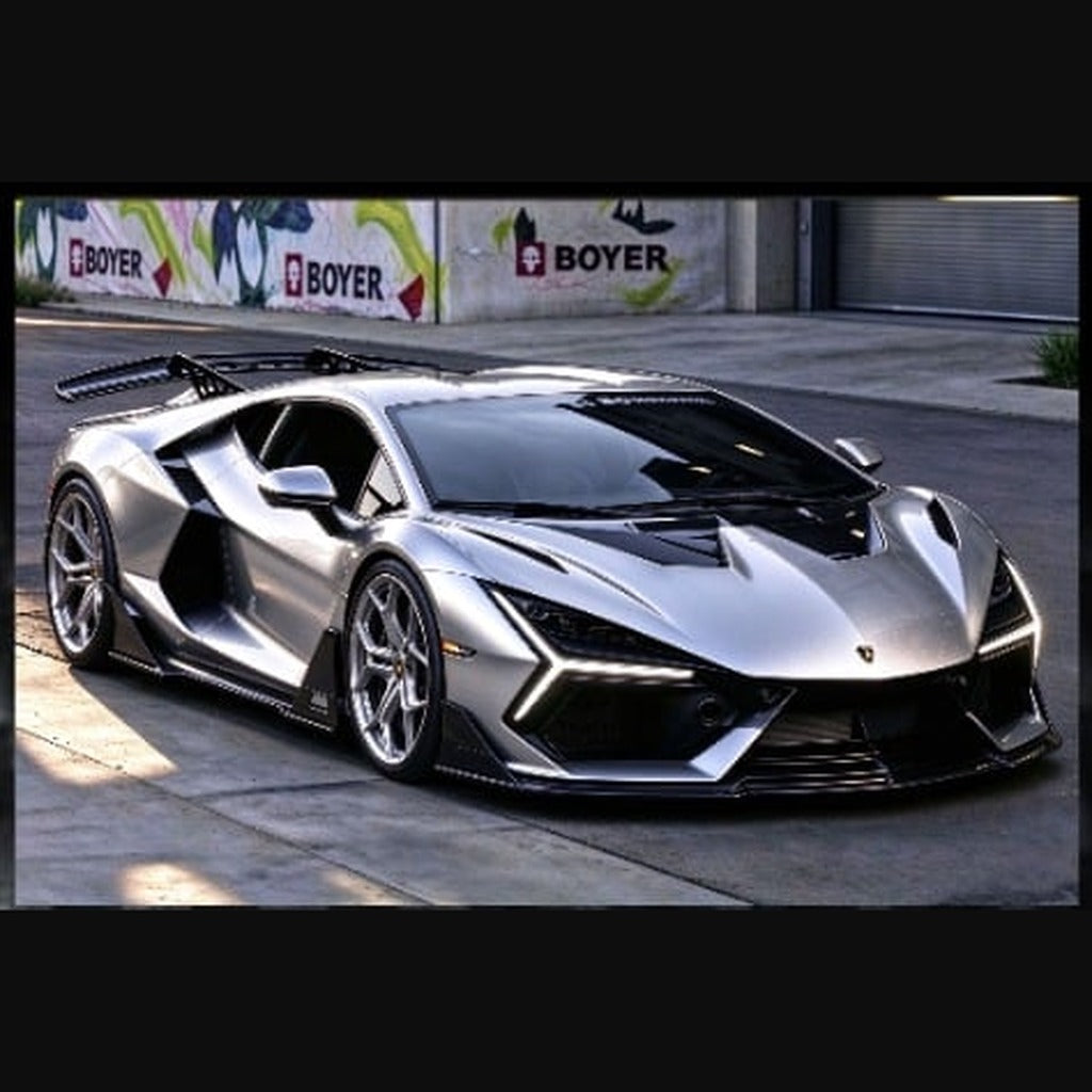 Alloy Art Lamborghini Revuelto Duke Modified Silver Gray 1:64 diecast, front three-quarter view of the real car with wing