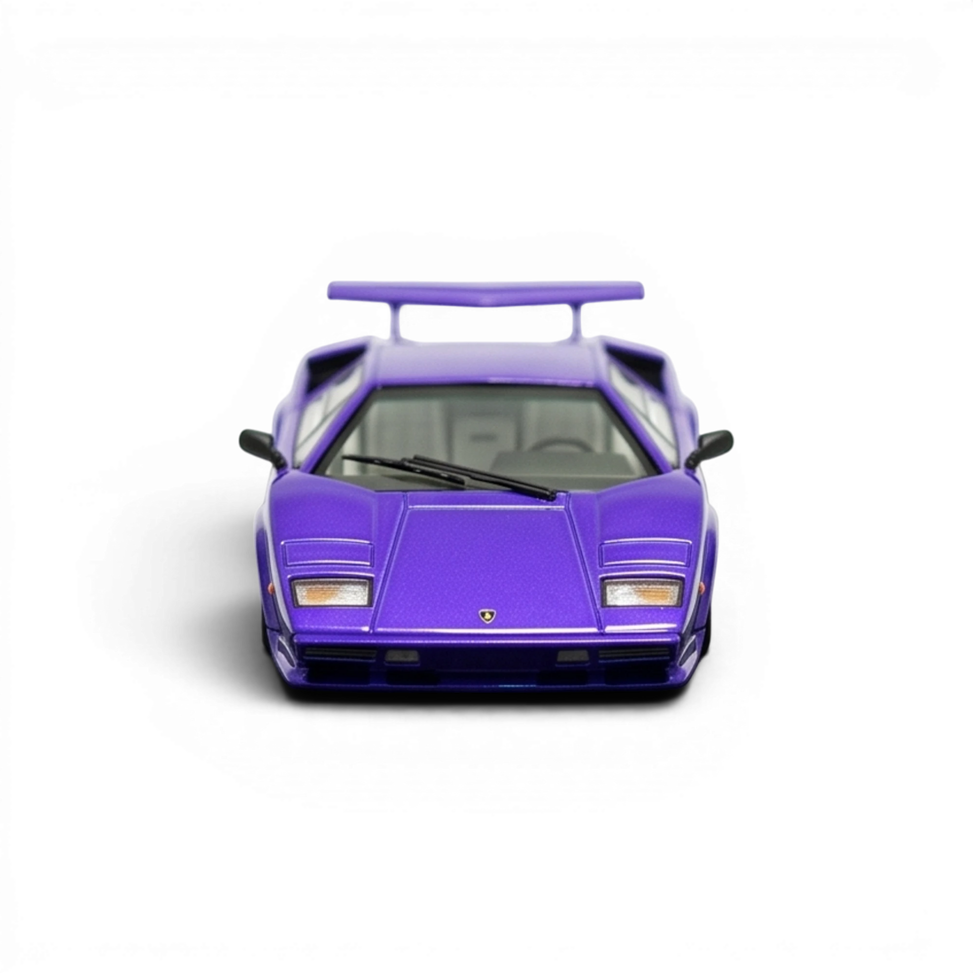 DeepMaker Lamborghini Countach 5000S 1:64 in Viola Salchi purple, head-on front view with wedge nose, twin wipers and rear wing above the roof.