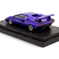DeepMaker Lamborghini Countach 5000S 1:64 in Viola Salchi purple, on a dark wood base, rear three-quarter with quad exhausts and rear wing.