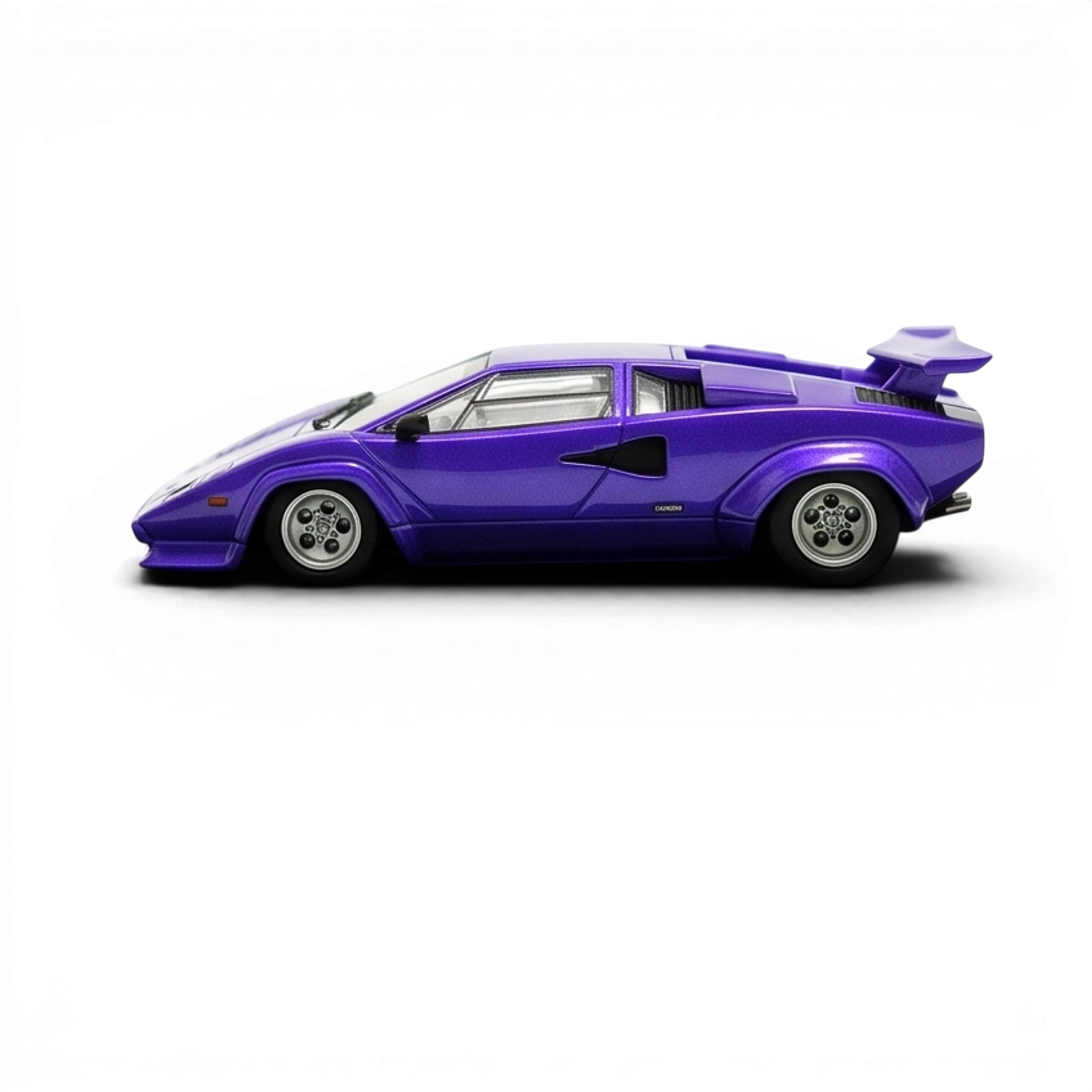 DeepMaker Lamborghini Countach 5000S 1:64 in Viola Salchi purple, full side profile showing the rear wing, side scoop and white interior.