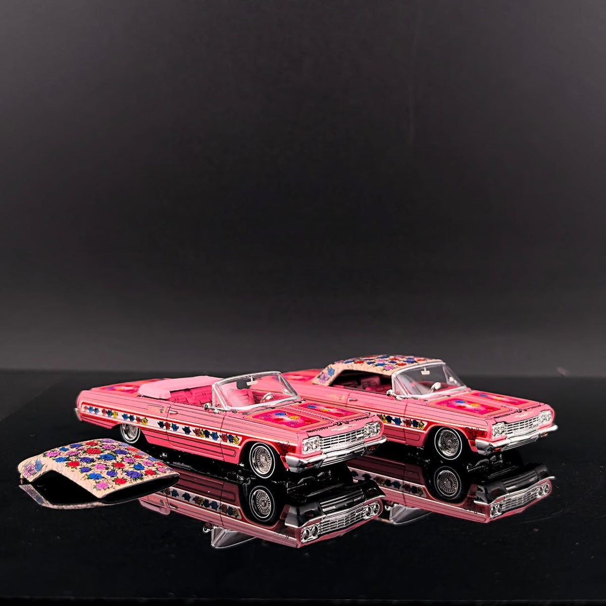 Gypsy Rose Impala convertible and hardtop with the removable roof panel beside them