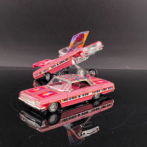 Fine Works64 Impala lowriders in pink Gypsy Rose livery, hardtop in front and lifted convertible behind, 1:64