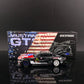 GT model Ford Mustang GT3 Black Monster 1:64 diecast model, side profile in front of its stars and stripes box