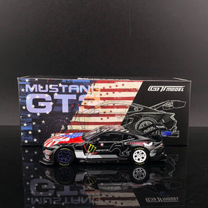 GT model Ford Mustang GT3 Black Monster 1:64 diecast model, side profile in front of its stars and stripes box