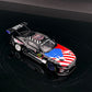 GT model Ford Mustang GT3 Black Monster 1:64 diecast model, front three-quarter view with US flag hood and rear wing
