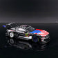GT model Ford Mustang GT3 Black Monster 1:64 diecast, front three-quarter with US flag hood and rear wing