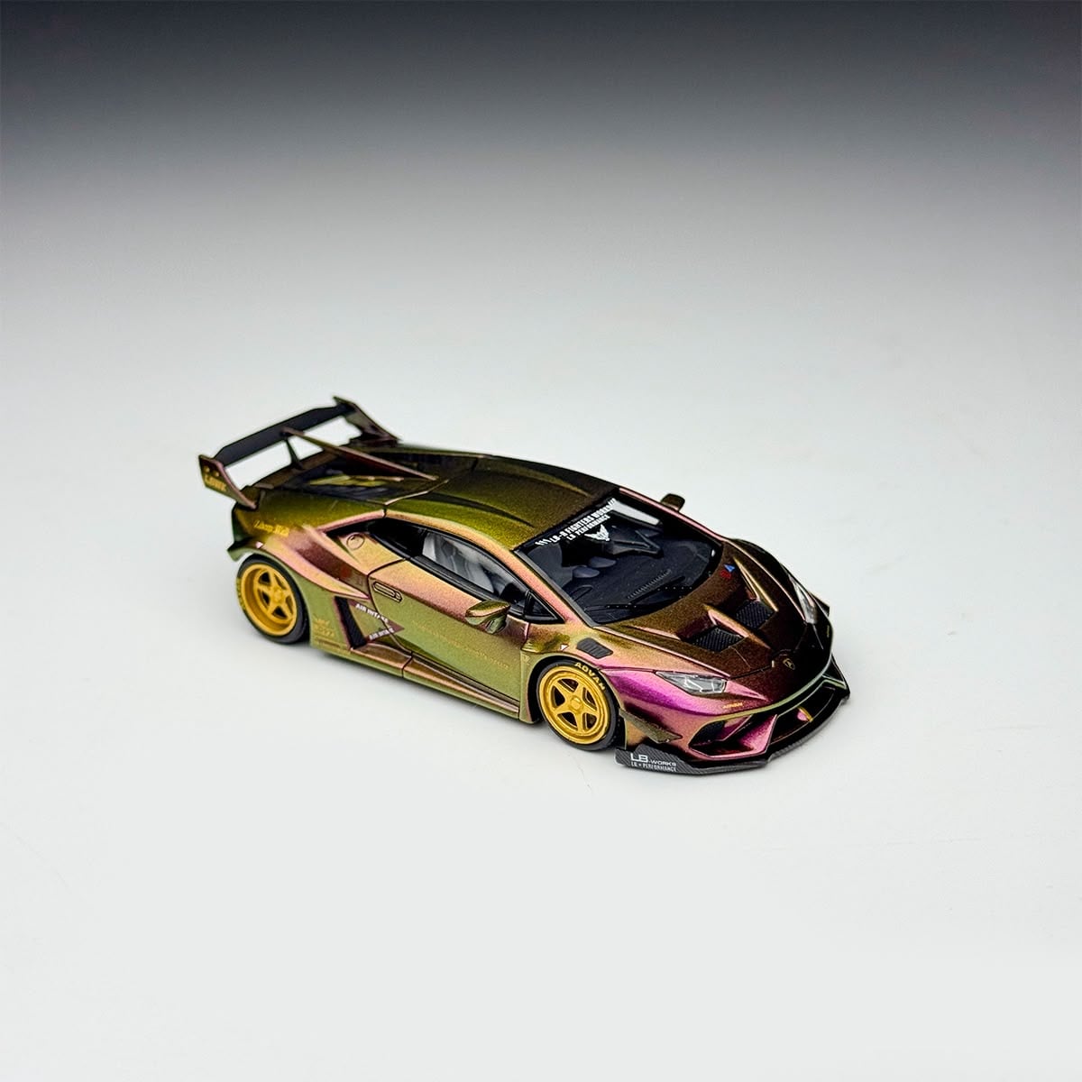 KINGMODEL LBWK Huracan GT in purple gold chameleon (iridescent) paint with gold wheels and big rear wing, 1:64