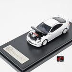 LCD Honda Integra DC5 Type-R 1:64 in white, front three-quarter with the carbon bonnet raised over the detailed engine bay