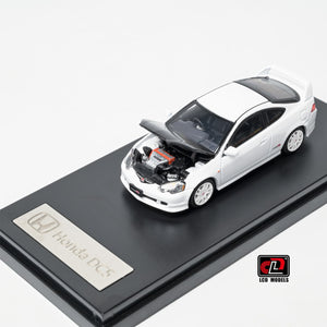 LCD Honda Integra DC5 Type-R 1:64 in white, front three-quarter with the carbon bonnet raised over the detailed engine bay