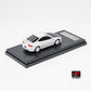 LCD Honda Integra DC5 Type-R 1:64 in white, rear three-quarter showing the tail lights, rear wing and carbon roof panel on the black display base