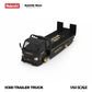 Close front three-quarter view of the black and gold RWB H300 trailer truck