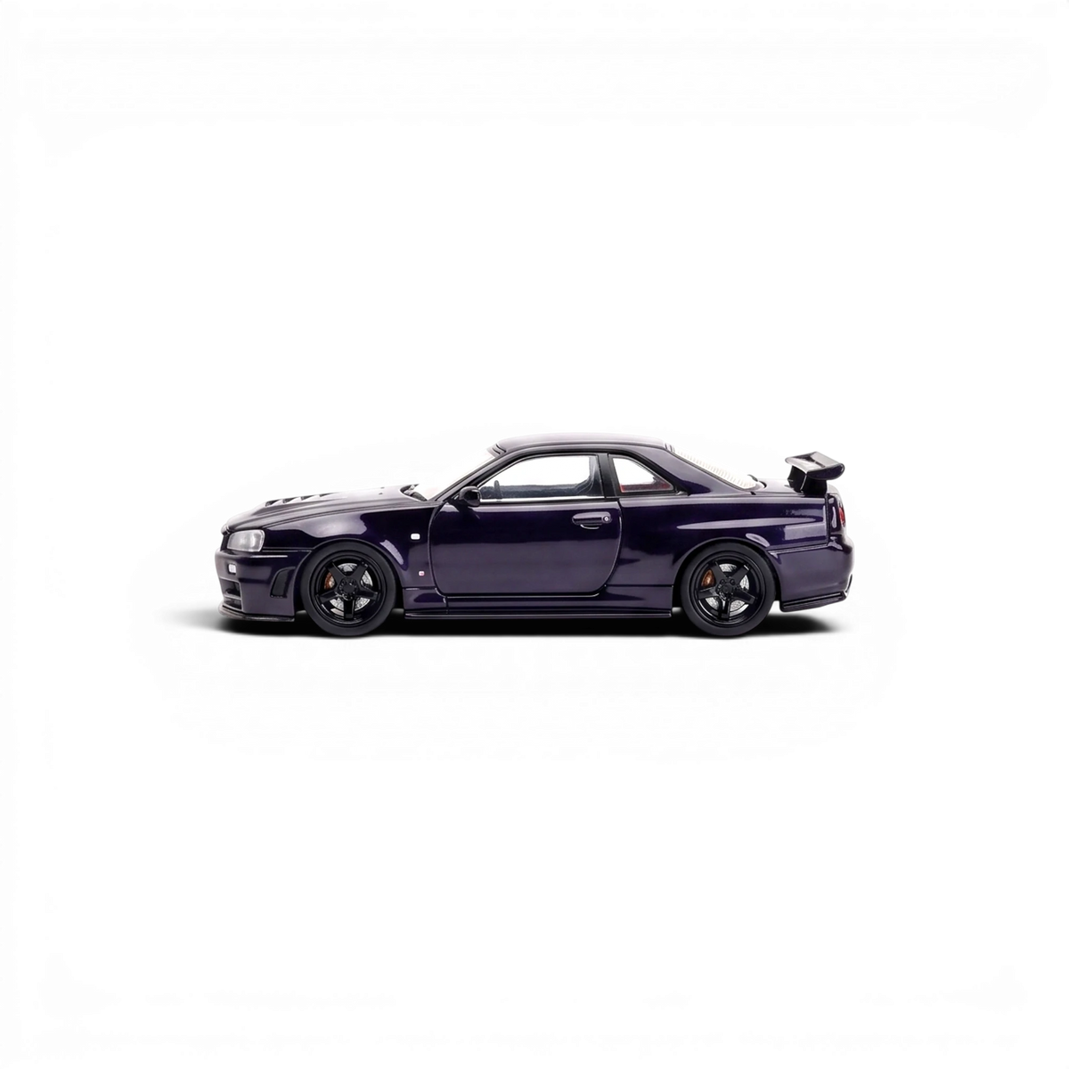 MOTORHELIX Nissan Skyline GT-R R34 midnight purple 1:64, left side profile on black showing black five-spoke wheels and red interior