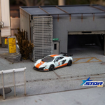 Star Models McLaren 650S Wide-Body - Gulf Livery (Ltd 699) 1:64 diecast model, front three-quarter in garage diorama