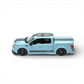 Lot57Supplies Diecast Shop: 1:64 scale light blue Ford F150 Super Snake diecast model with black racing stripes, removable bed cover, and opening tailgate.
