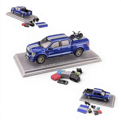 Lot57Supplies Diecast Shop blue 1:64 scale Ford Shelby F-150 pickup truck with white racing stripes and a bicycle on the bed cover.