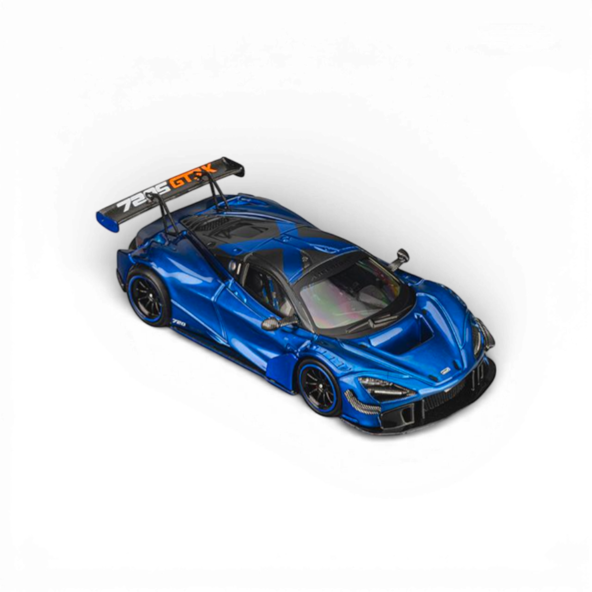 Lot57Supplies Diecast Shop 1:64 scale CM Model McLaren 720S GT3X in Aurora Blue with large rear wing.