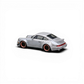 Lot57Supplies Diecast Shop CM Model Porsche 964 widebody diecast model car, gray with copper-rimmed wheels and snap-on feature.