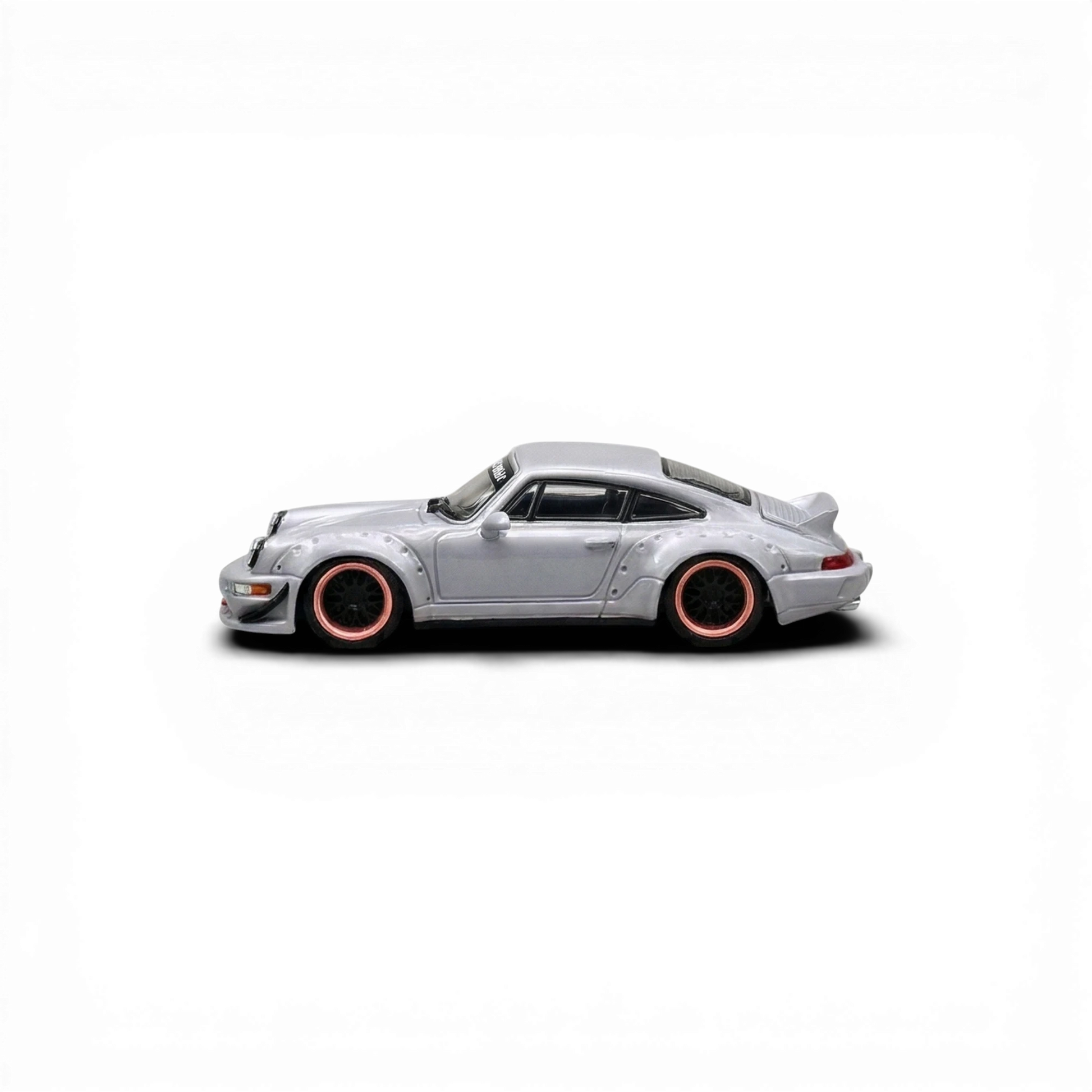 Lot57Supplies Diecast Shop: CM Model Porsche 964 widebody diecast model car, gray with rose gold rims and black mesh wheels.