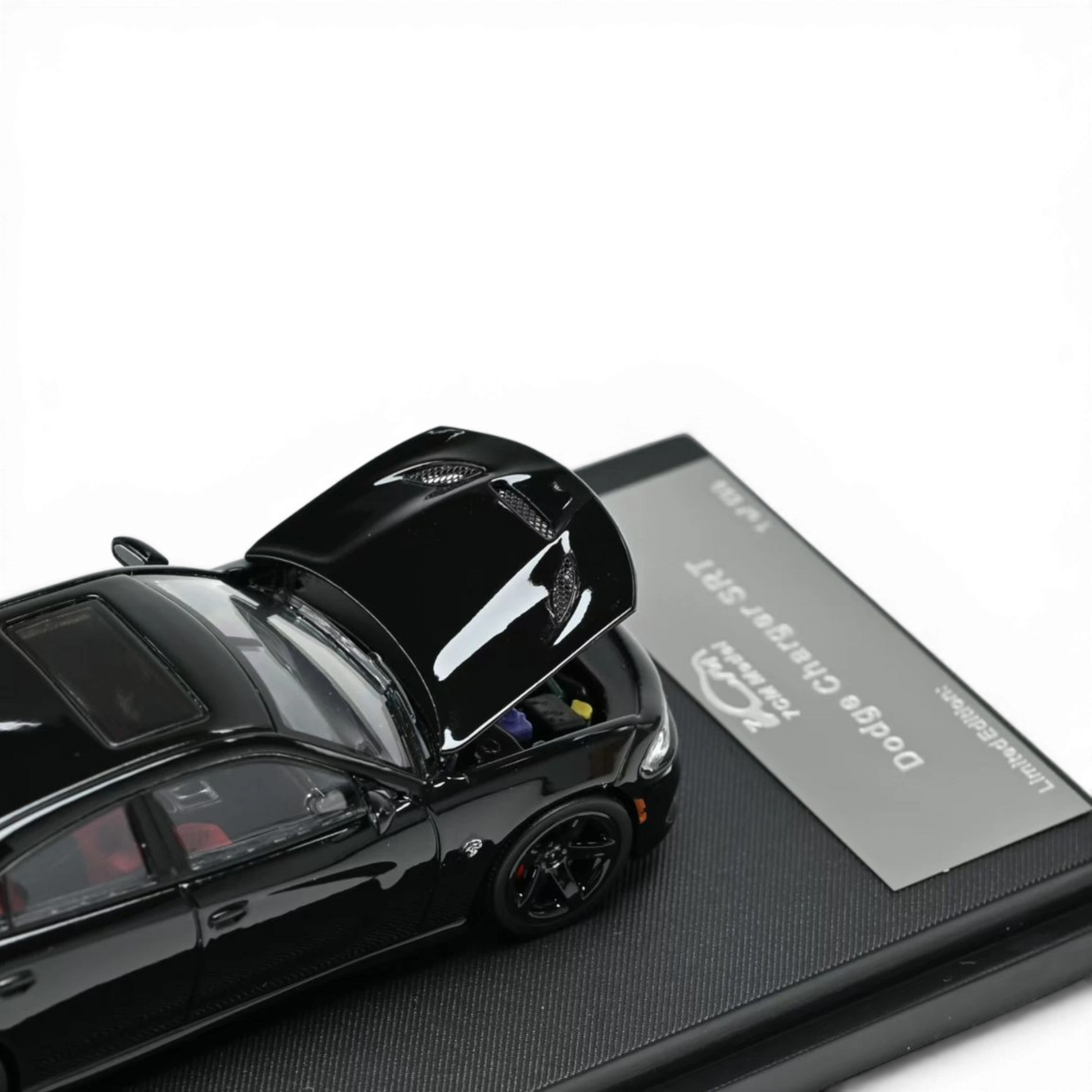 Lot57Supplies Diecast Shop 1:64 scale Pitch Black 2023 Dodge Charger SRT Hellcat model with open hood.