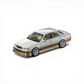 Lot57Supplies Diecast Shop 1:64 scale pearl white and gold diecast Cresta model car with metallic paint.