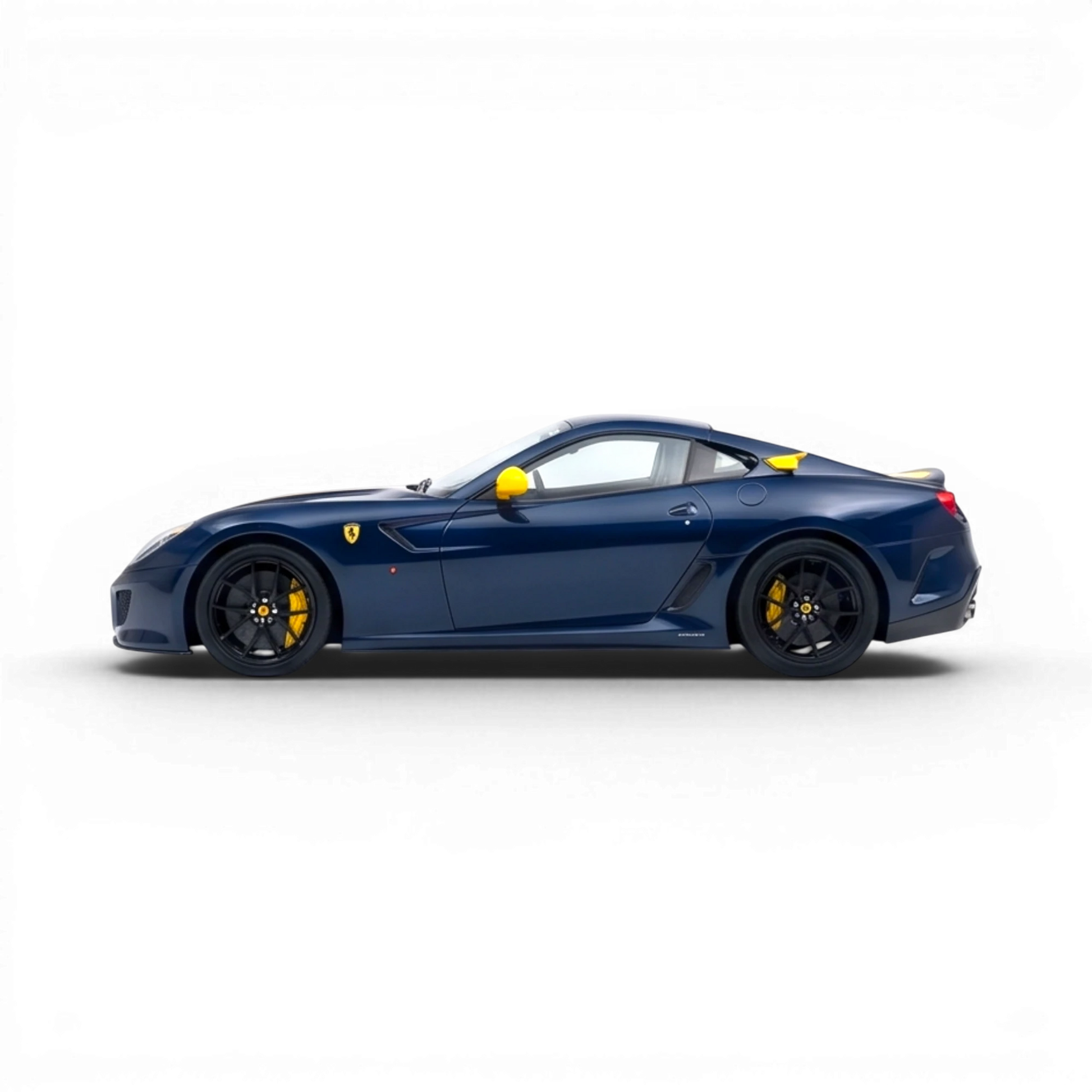 Lot57Supplies Diecast Shop 1:64 scale dark blue diecast model of a Ferrari 599 GTO with yellow accents and a yellow stripe.