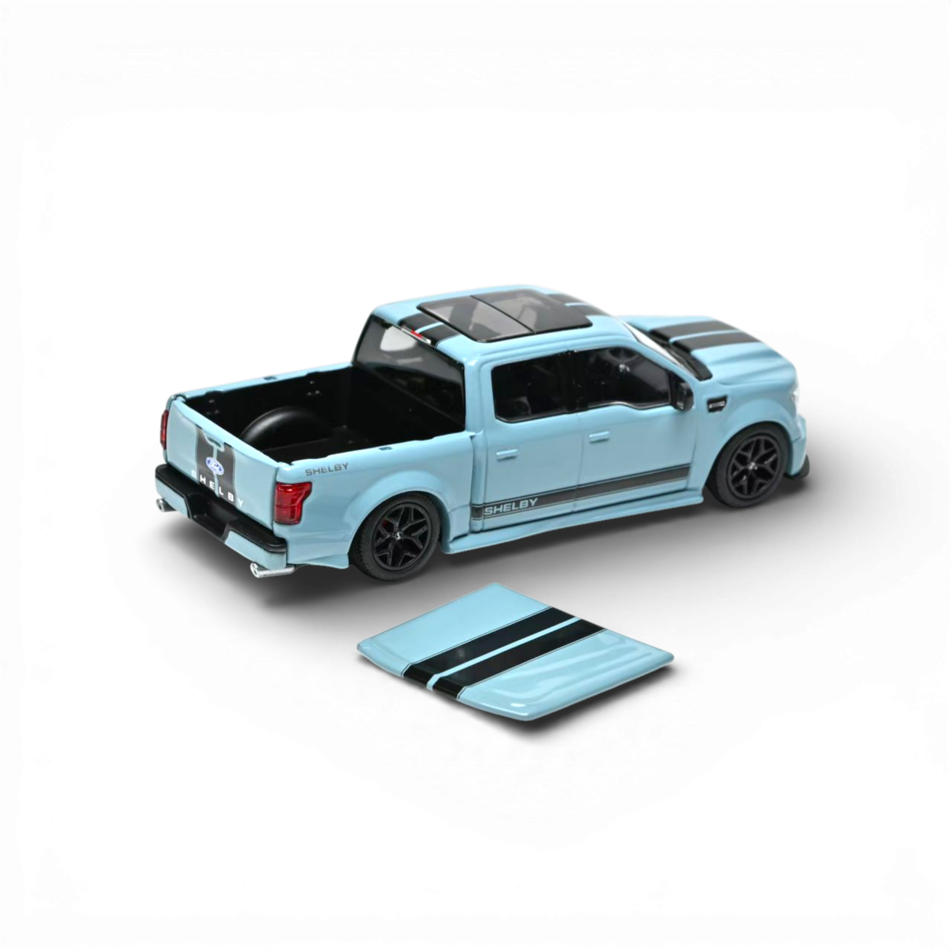 Lot57Supplies Diecast Shop blue 1:64 scale Funny Model Ford F150 Super Snake diecast truck with black racing stripes, opening tailgate, and removable bed cover.