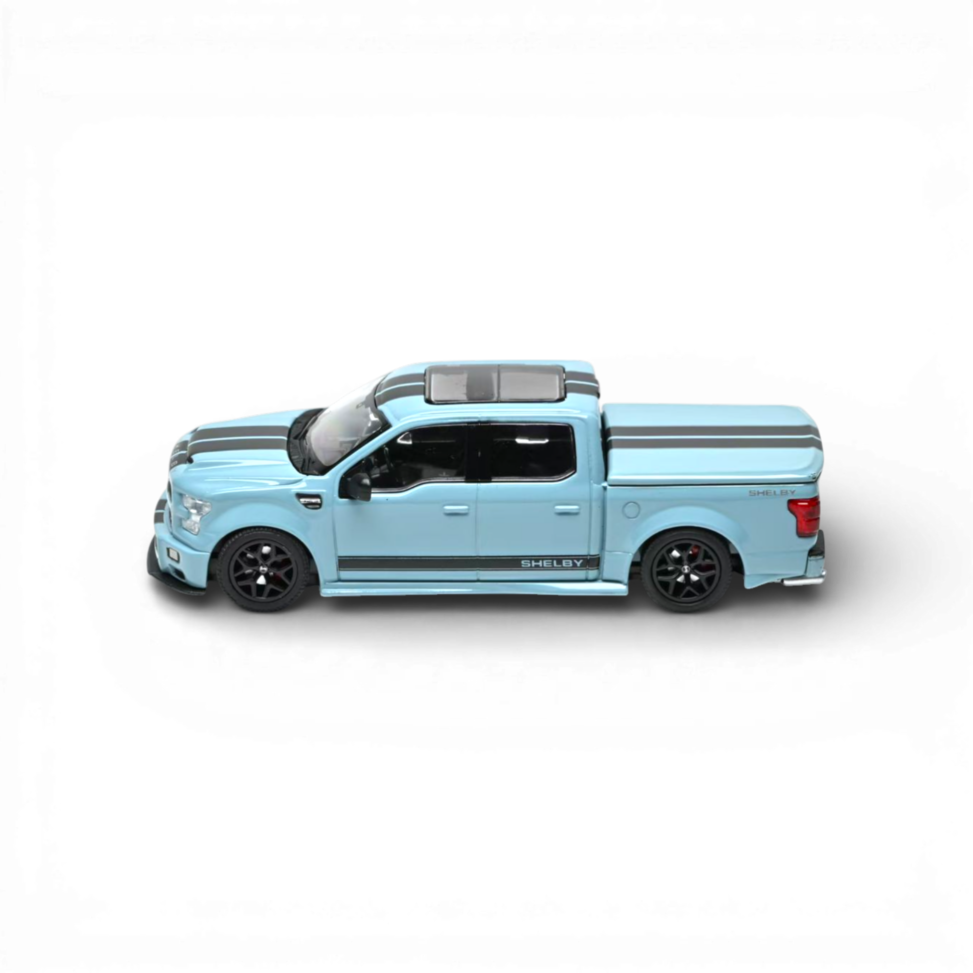 Lot57Supplies Diecast Shop blue 1:64 scale Funny Model Ford F150 Super Snake diecast truck with black racing stripes, opening tailgate, and removable bed cover.