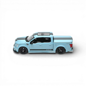 Lot57Supplies Diecast Shop blue 1:64 scale Funny Model Ford F150 Super Snake diecast truck with black racing stripes, opening tailgate, and removable bed cover.