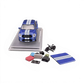 Lot57Supplies Diecast Shop 1:64 blue Ford Shelby F-150 pickup truck with white racing stripes, displayed with accessories.