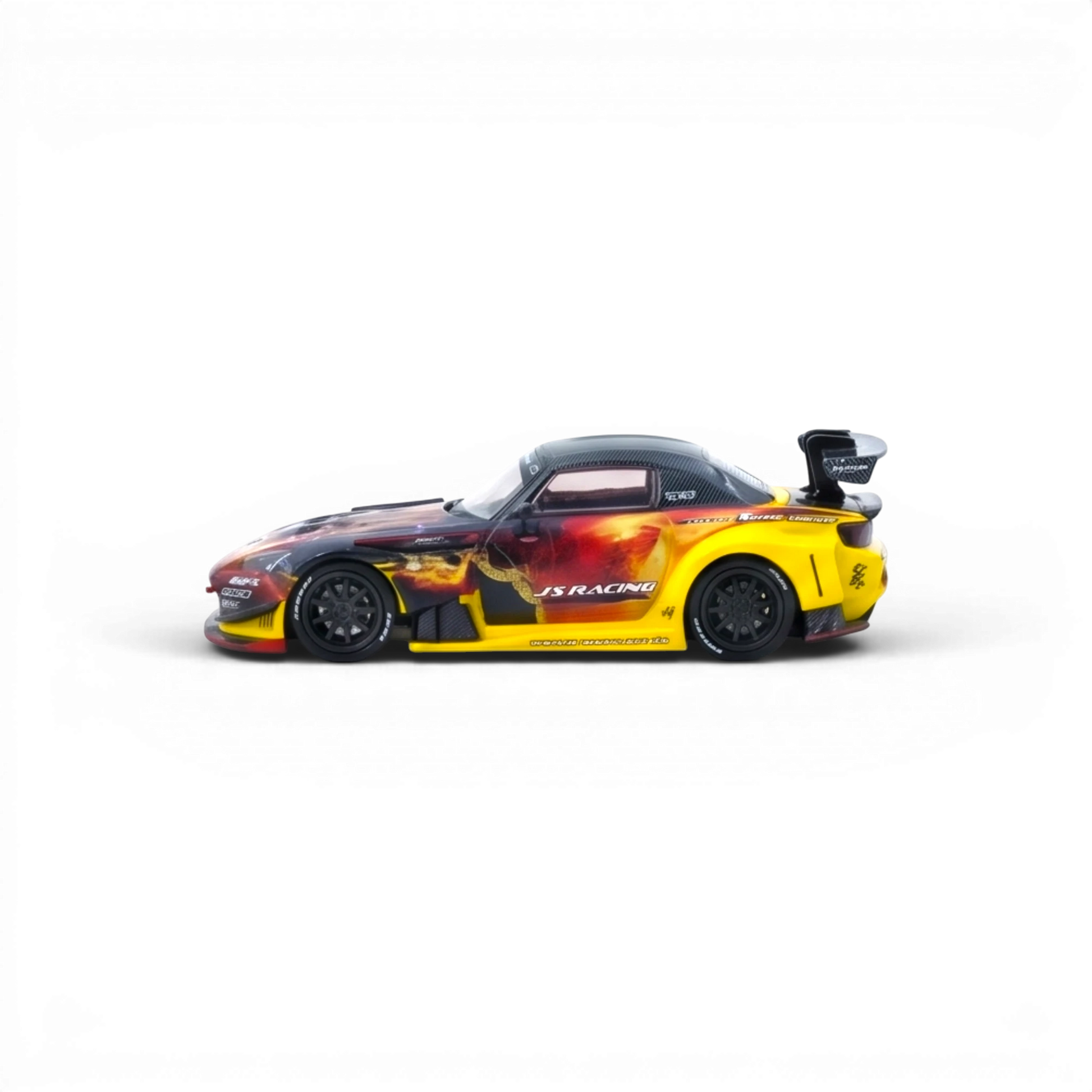 Lot57Supplies Diecast Shop: Yellow and black 1:64 scale INNO64 Honda S2000 J's Racing AP1 diecast model with flame graphics and large rear spoiler.